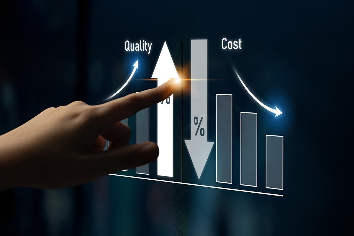 Person's finger points at a bar chart labeled 'Quality' rising on the left and 'Cost' declining on the right, illustrating trade-off.